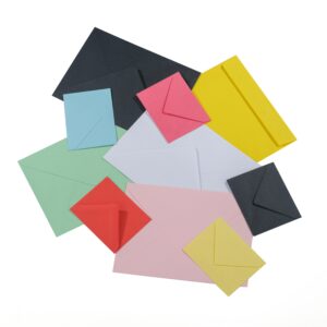 A vibrant assortment of multicolored envelopes arranged on a white surface.
