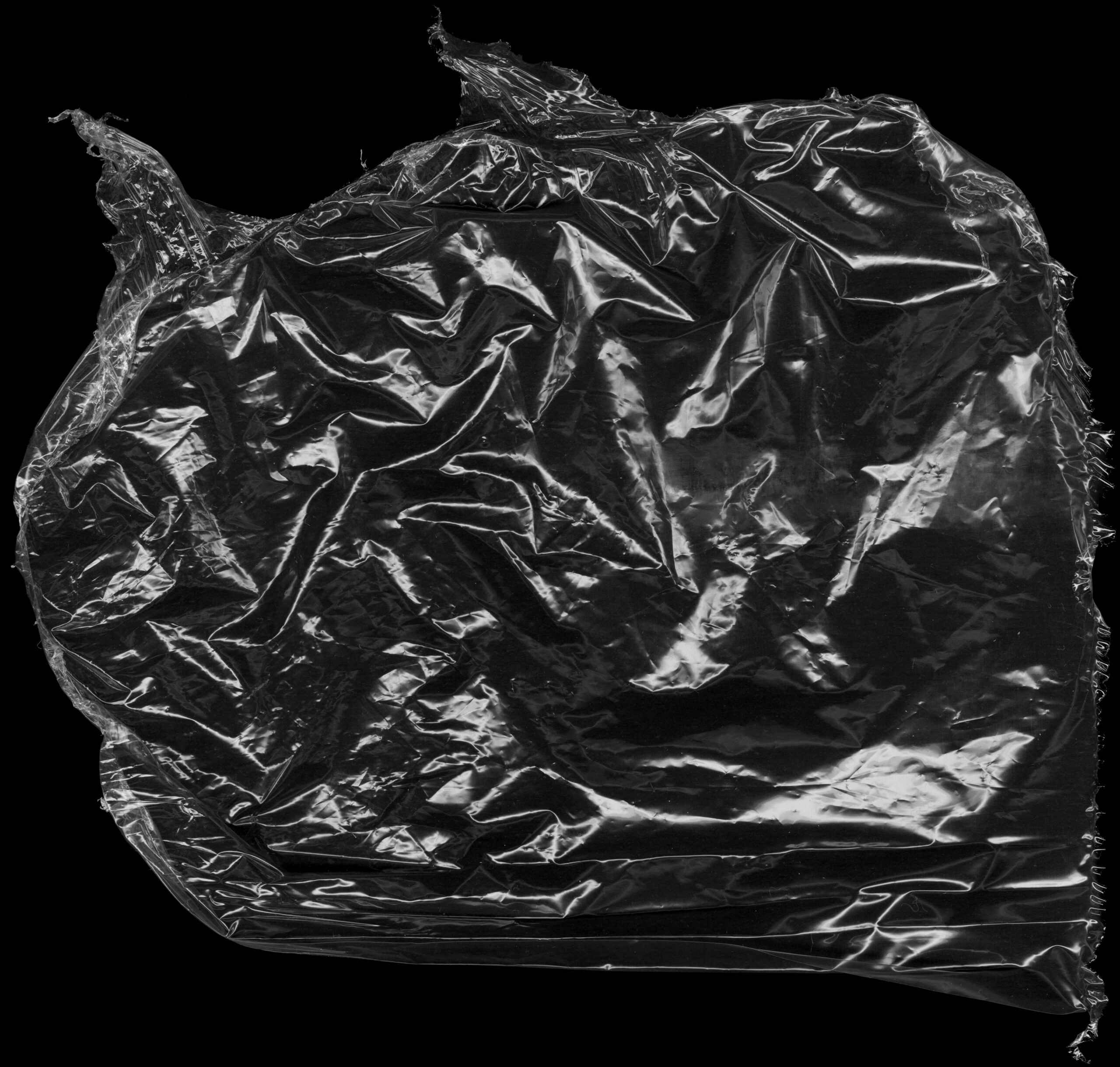 pexels photo 18541871 18541871 High-resolution image of crumpled plastic wrap showcasing texture and detail.