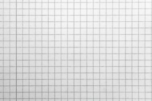 High-resolution image of blank grid paper, perfect for backgrounds.