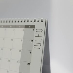 Minimalistic desk calendar displaying the month of July with a focus on weekdays.