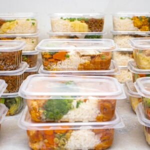 Multiple containers of prepared meals with rice and vegetables for easy meal management.
