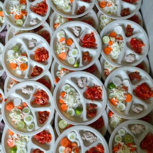Top view of vibrant vegetable platters with fresh salads, perfect for a healthy diet.