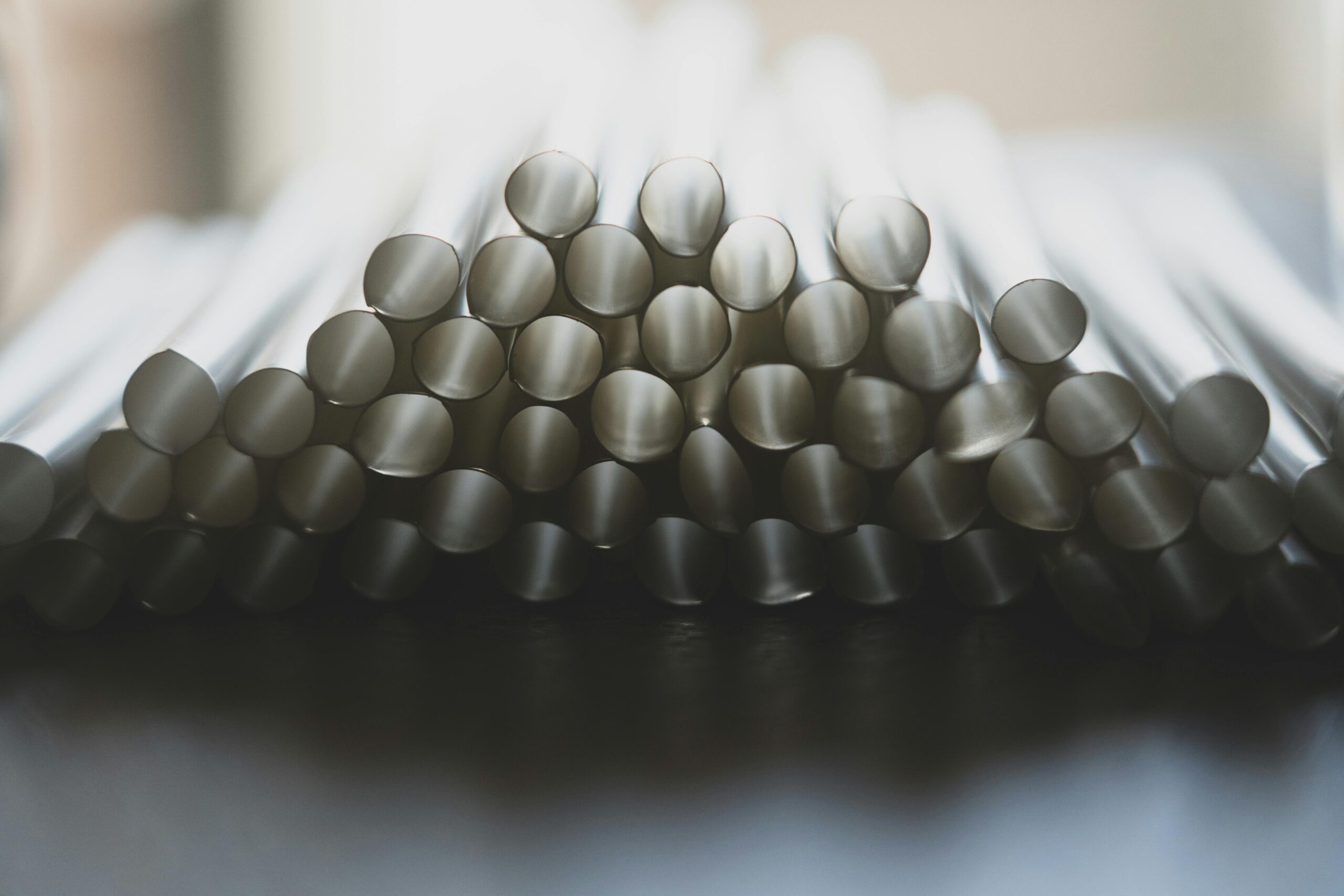 pexels photo 3693354 3693354 A pile of reusable metal straws stacked neatly, showcasing eco-friendly design.
